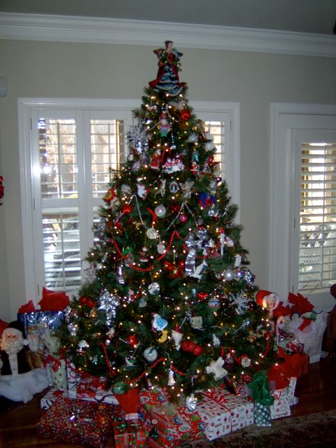 Ours is a traditional tree, filled with homemade gifts and souvenir ornaments from all of our trips.
